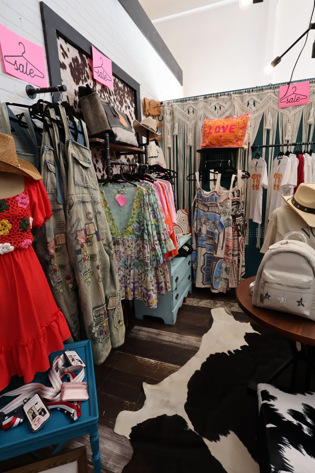 Colorful boutique clothing and accessories inside Mercantile at the Ridge