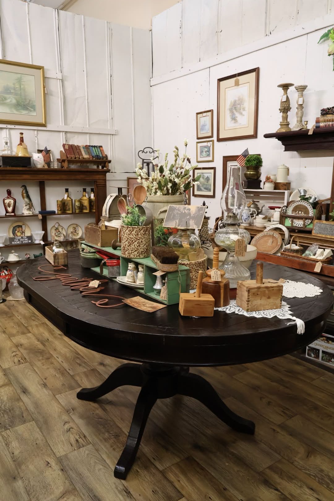 Curated antique and home décor display inside Mercantile at the Ridge
